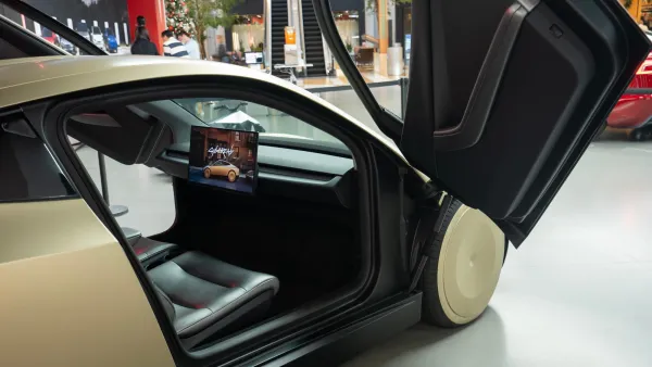 Gold Tesla Cybercab prototype being shown in showroom in Bellevue, Washington.