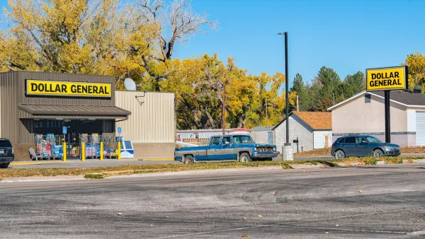 A Dollar General store with vontage truck parked in front in Atwood, Kansas.