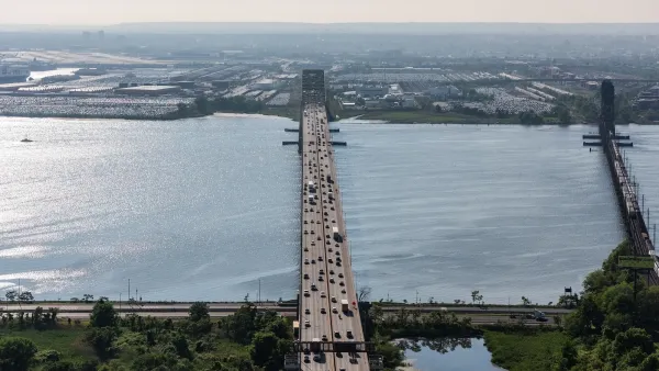 Aerial view of Newark Bay Bridge with light traffic.