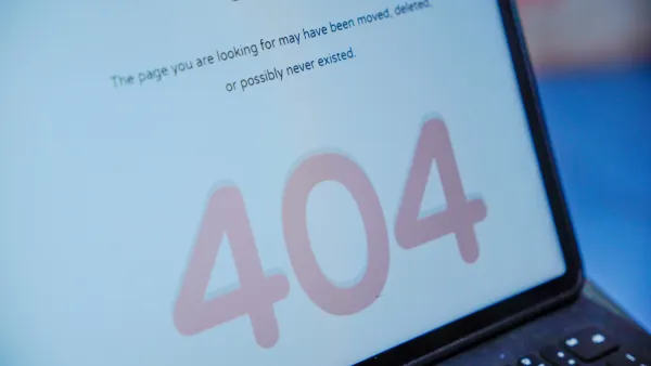 Close-up of laptop screen with 404 error.