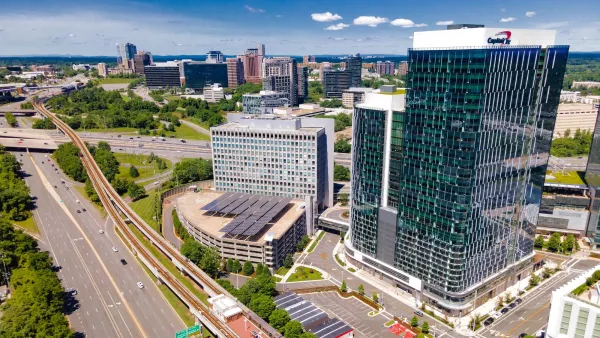 Aerial view of the city's architecture, Tysons Corner, skyscrapers and metro station.