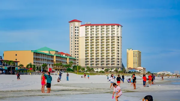 People relax on Pensacola Beach.