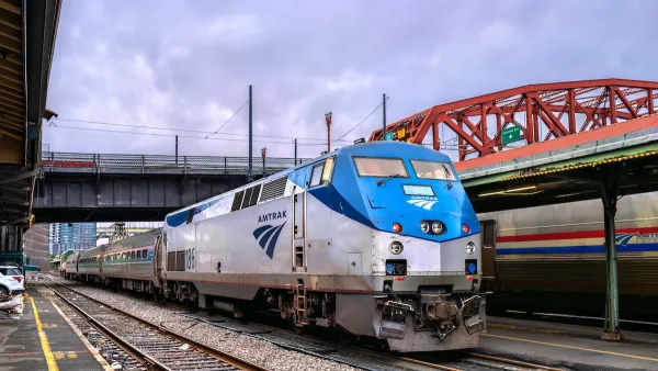 An Amtrak train pulls into a station in Portland.