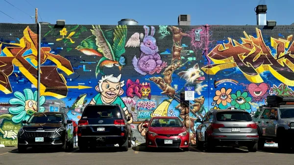 Colorful mural in Denver parking lot.