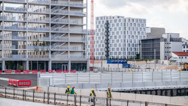 Multistory housing under construction in Milan for 2026 Olympic Village.