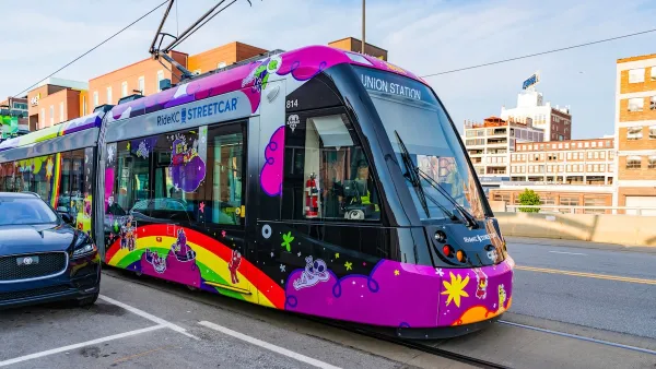 Colorful pink Kansas City streetcar.