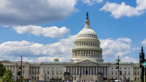 US Capitol dome in Washington DC with people walking around in front.
