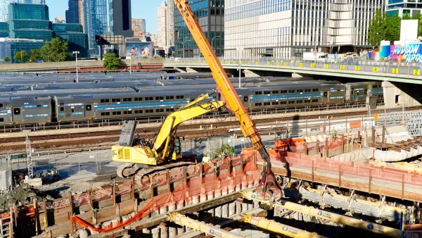 Construction on Gateway Tunnel with large yellow crane in New York City.