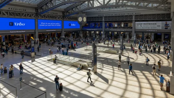 Passengers in Moynihan Train Hall at Penn Station in New York City.