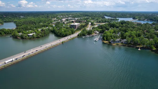 An aerial view of Interstate 77 crossing a body of water.