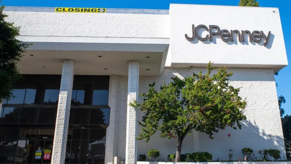 A JC Penney store with a yellow CLOSING banner hanging from the roof.