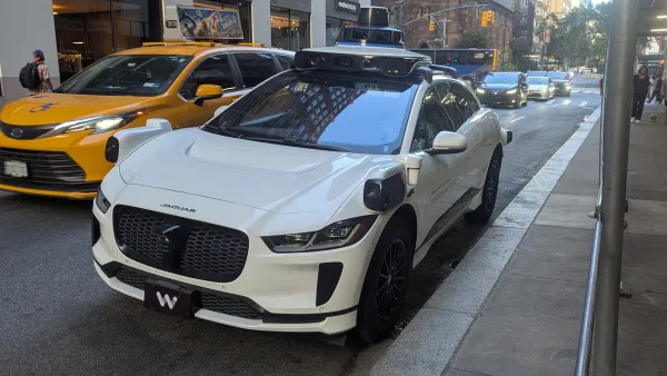 White Waymo Jaguar car in New York City.
