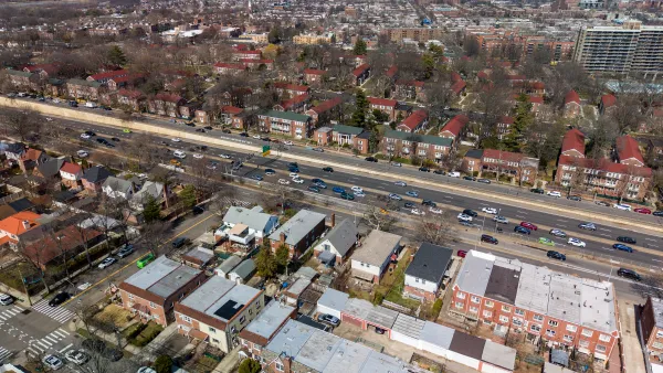 A dense neighborhood, with the long island expressway running through it.