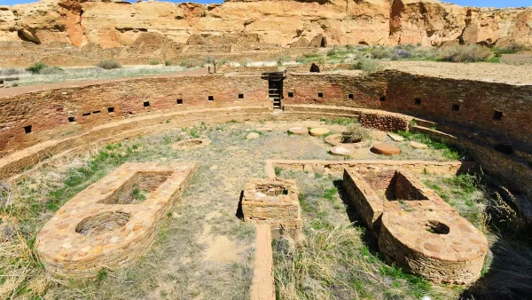 Stone ruins of Native American kivas in archaeological site at Chaco Canyon, New Mexico.
