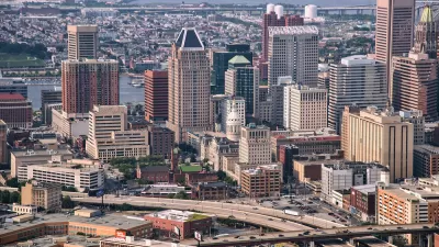 Aerial view of downtown Baltimore, Maryland with freeways in foreground