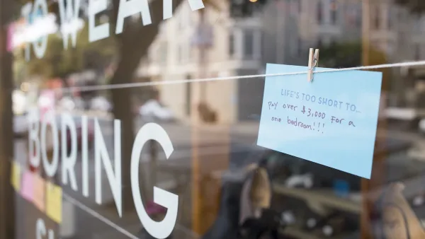 Sign in a window stating "Life's Too Short To Pay Over $3,000 for a bedroom" which signifies the rent crisis in San Francisco due to the technology boom & lack of housing forcing rent prices upwards.