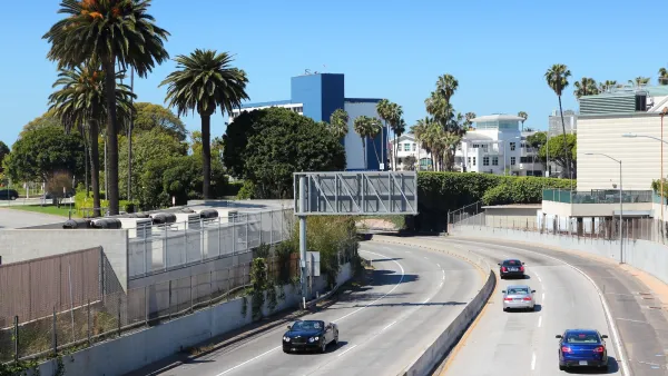 A few cars on the I-10 interstate freeway in Santa Monica, California.