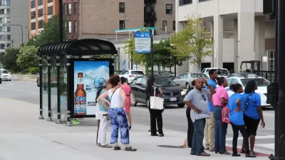 People waiting at a Chicago bus stop