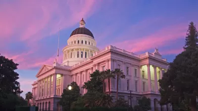 California state capitol building against purple and blue sunset sky