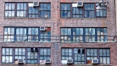 Window air conditioner units on a brick building