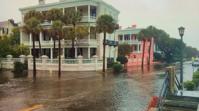 Flooded street with historic home in Charleston, South Carolina