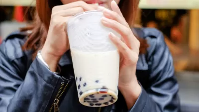 Close-up of woman drinking boba bubble tea through straw