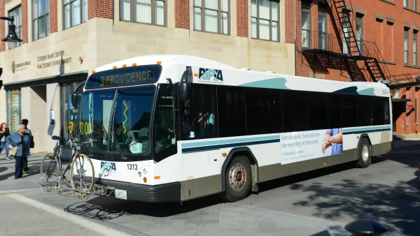 White Rhode Island RIPTA transit bus.