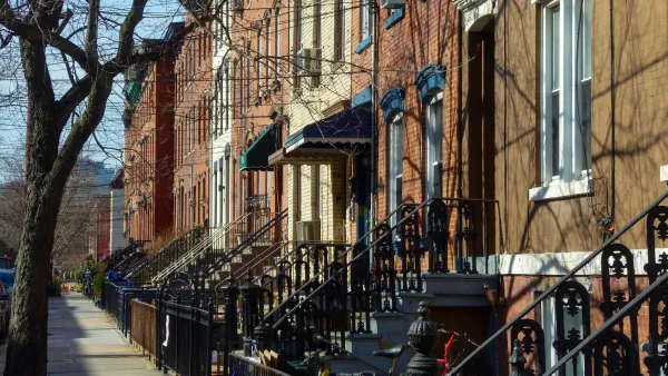 Row of brick walk-up residential buildings in New Jersey.