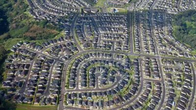 Aerial view of planned community with houses and winding streets in Pearl City, Oahu