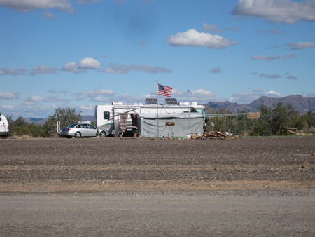 Old Glory flies high over many RVs at Quartzsite, which attracts a mainly aging, silver-haired and right-leaning crowd.